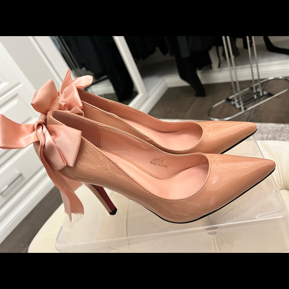 Elegant Nude Heels with Red Bottoms and Bow Accent ❤️
